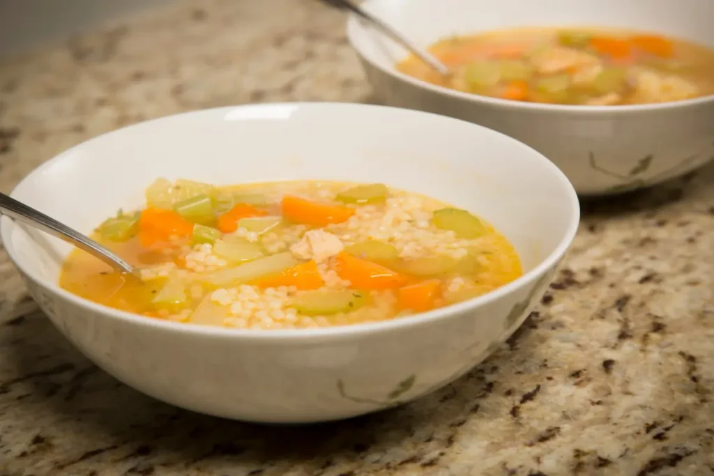 "Sicilian seafood Pastina with shrimp, mussels, and fish broth"